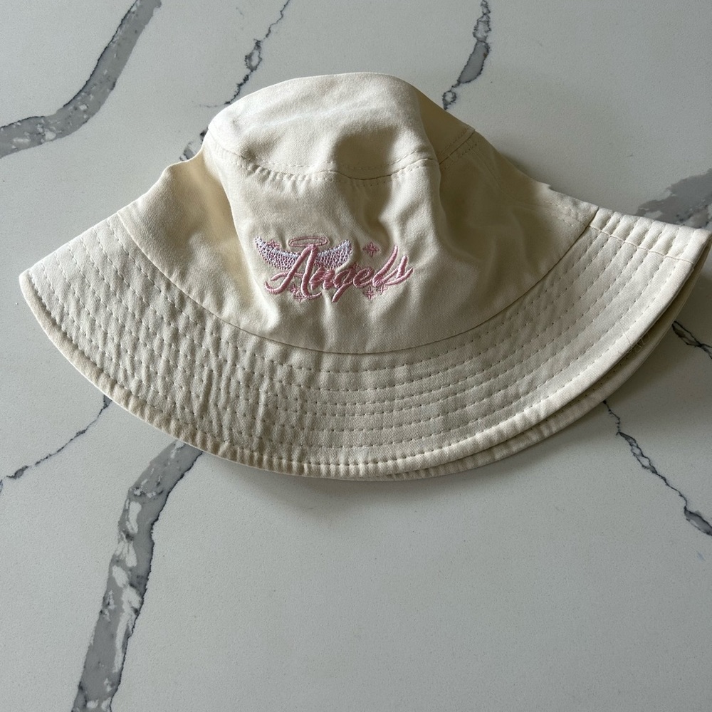 “Angel” Cream Colored Bucket Hat With Pink Lettering